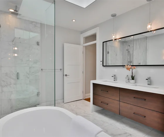 Luxury Bathroom Monterey Renovation With A Double Vanity And A Walk-In Shower